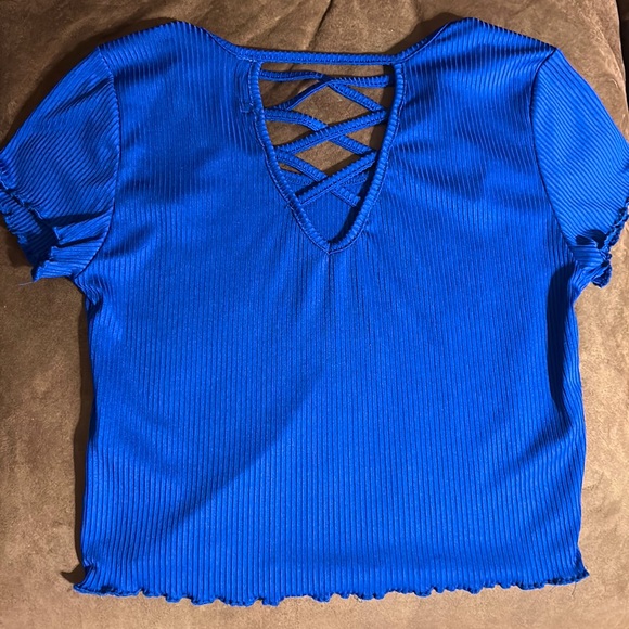 Blue crop top with back detail. Worn once. No holes or stains. Size L. - Picture 2 of 3